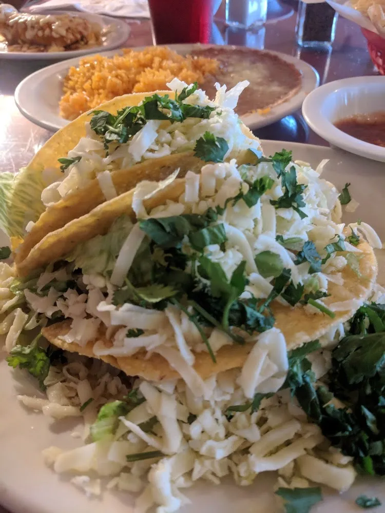 Three Steak Taco a La Carte with Sour Cream
